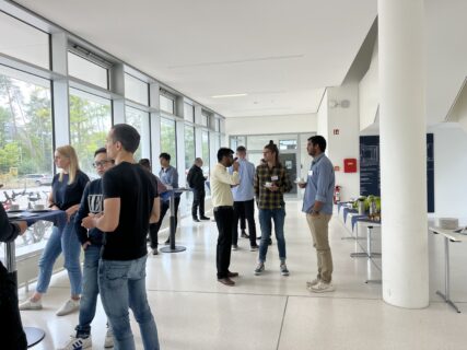 Our past cohort is mingling with potential new PhD candidates (image: AH)